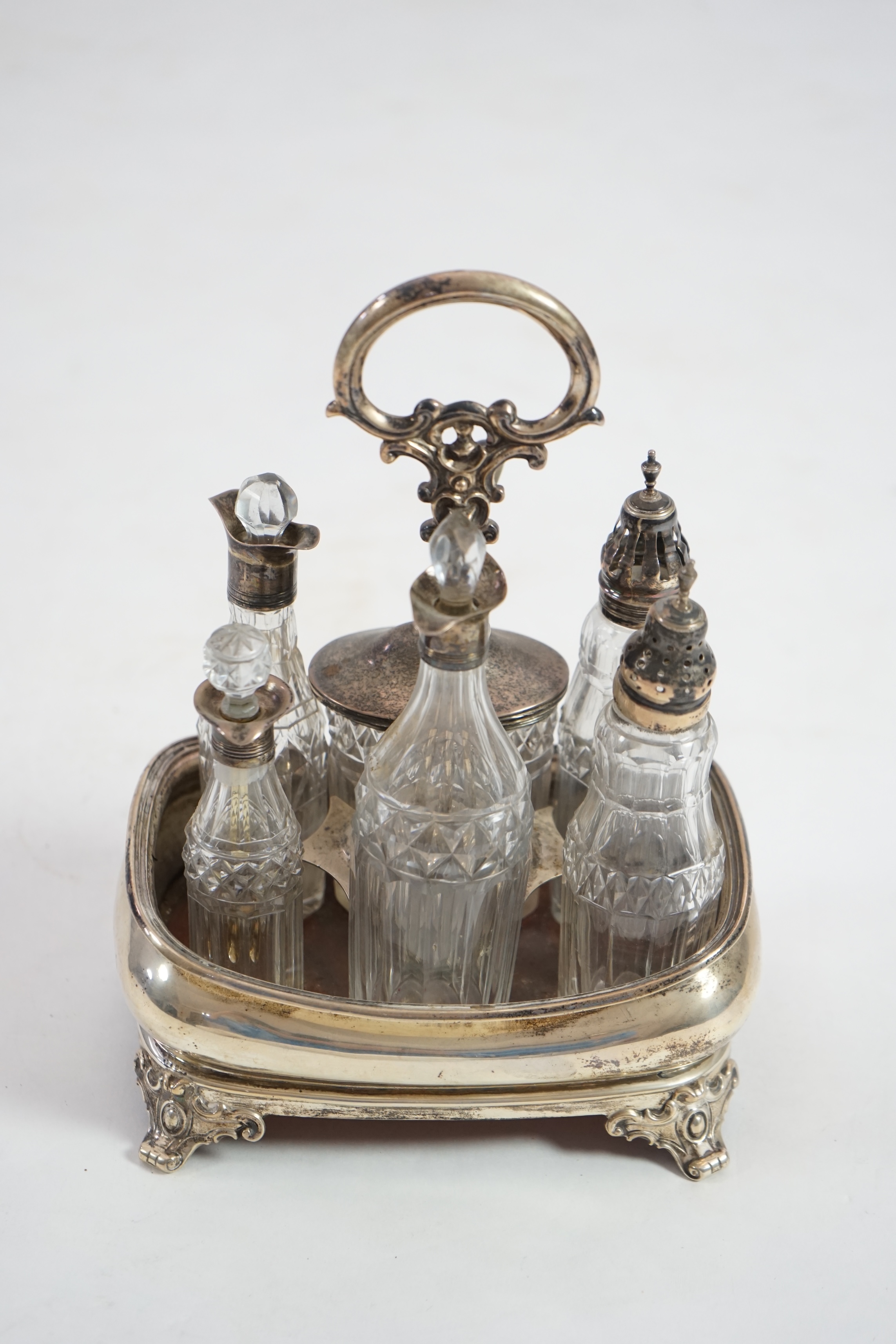 An early 19th century silver cruet stand